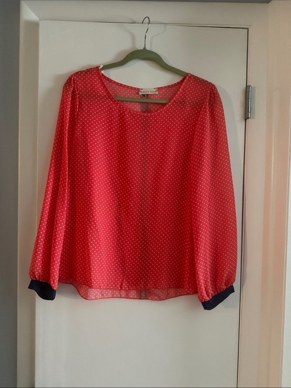Coral Pink Polka Dot Long-Sleeve Blouse with Navy Cuffs and Navy detail at back